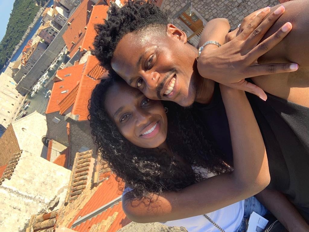 Anya and Rich smiling together on holiday